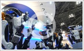 川田工業のヒト型産業用ロボット「NEXTAGE」3台協調デモ